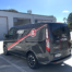 Rear view of FERNO fleet branding Ford Transit Custom van in industrial complex